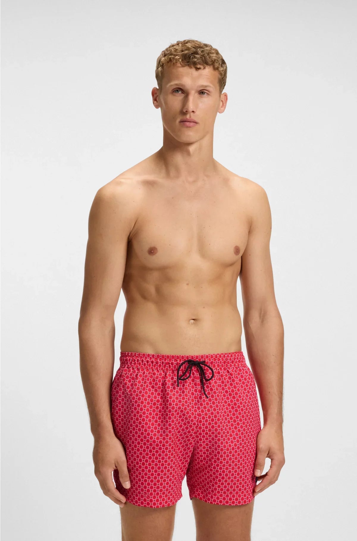 PRINTED SWIM SHORTS WITH LOGO BADGE