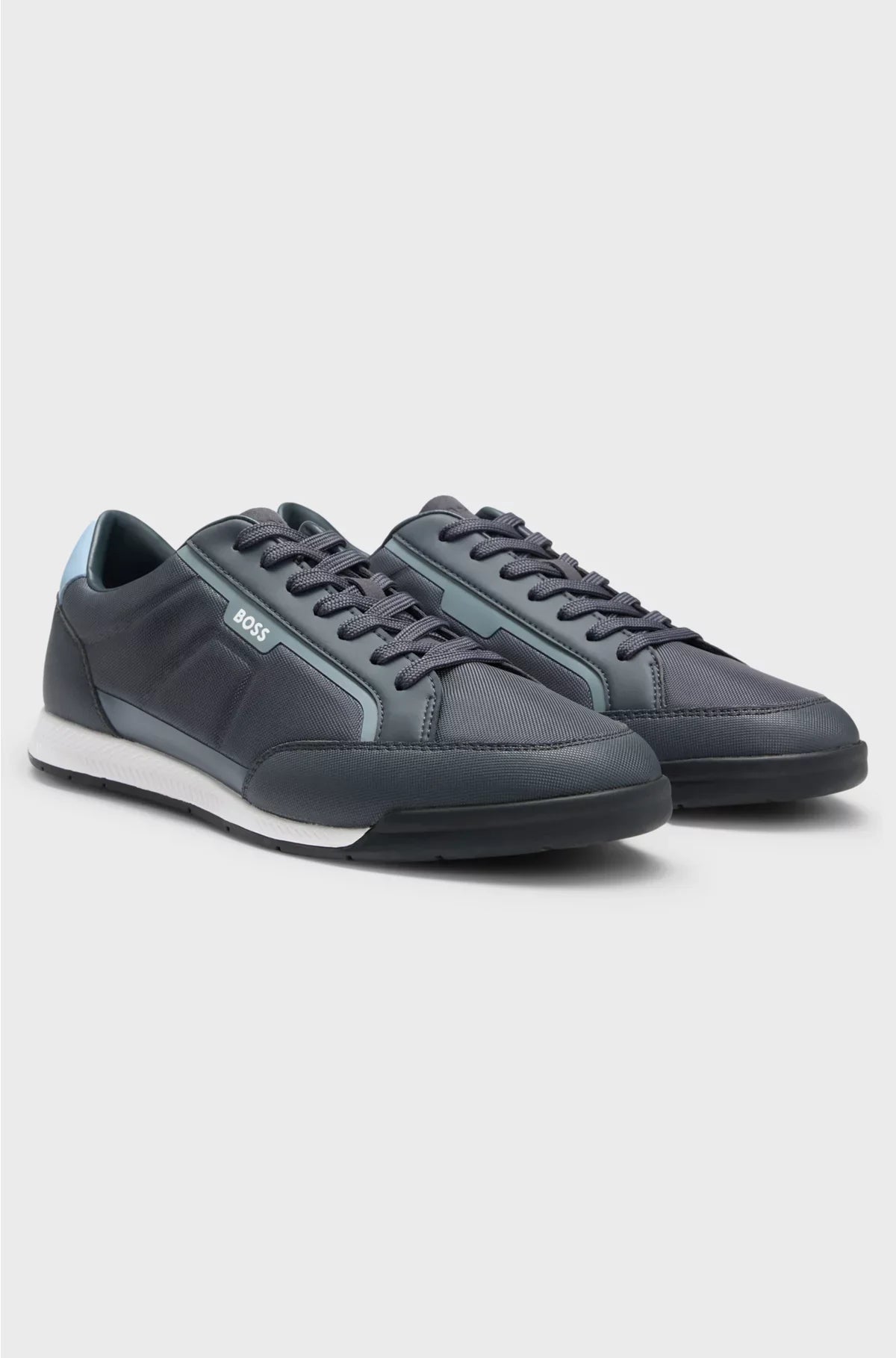 SNEAKERS IN MATERIALI MISTI CON TALLONCINO A CONTRASTO