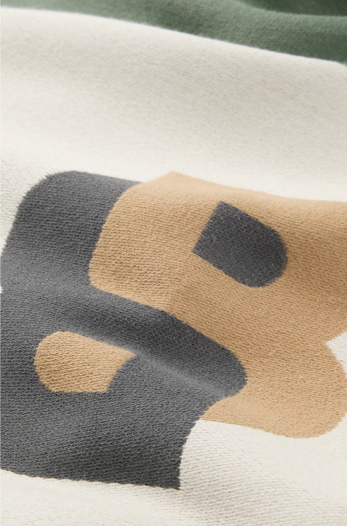 JACQUARD CUSHION COVER WITH WHIPSTITCHING