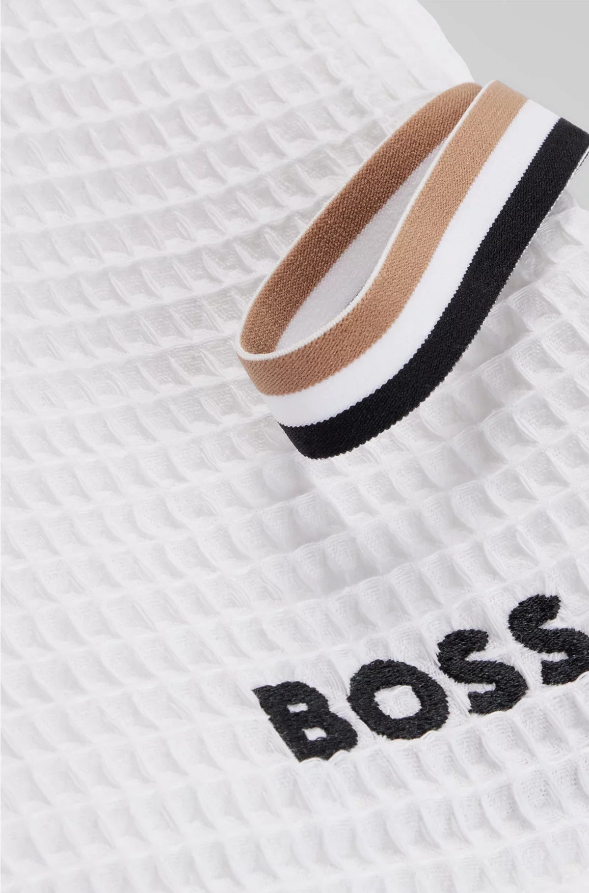HONEYCOMB-COTTON HAND TOWEL WITH SIGNATURE-STRIPE STRAP