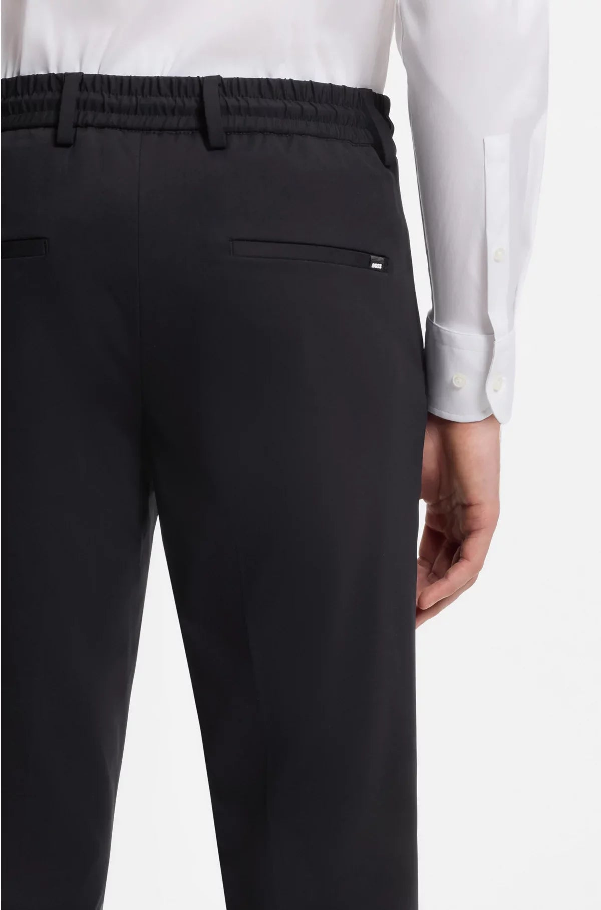 SLIM-FIT TROUSERS IN PERFORMANCE-STRETCH JERSEY