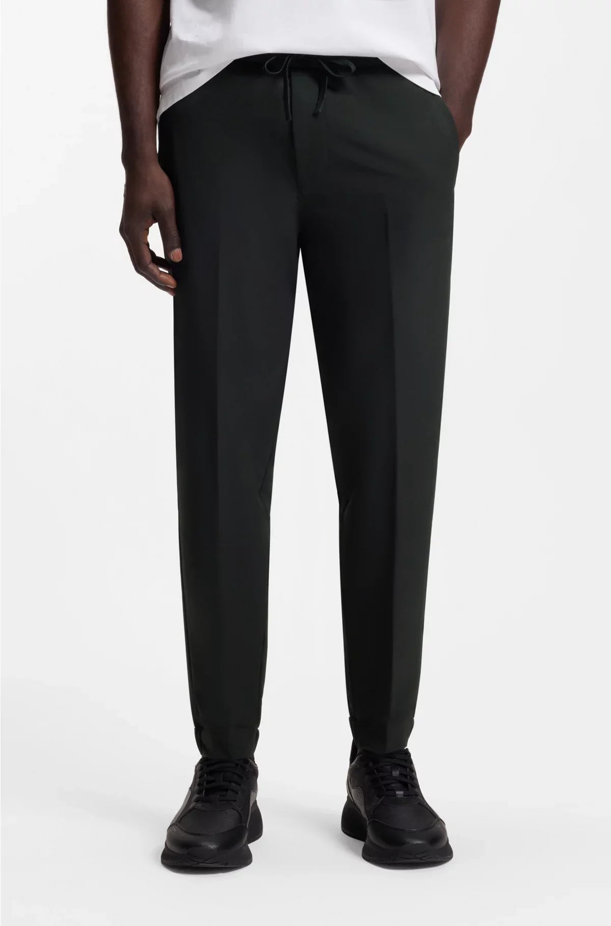 TAPERED-FIT TROUSERS IN WATER-REPELLENT STRETCH FABRIC