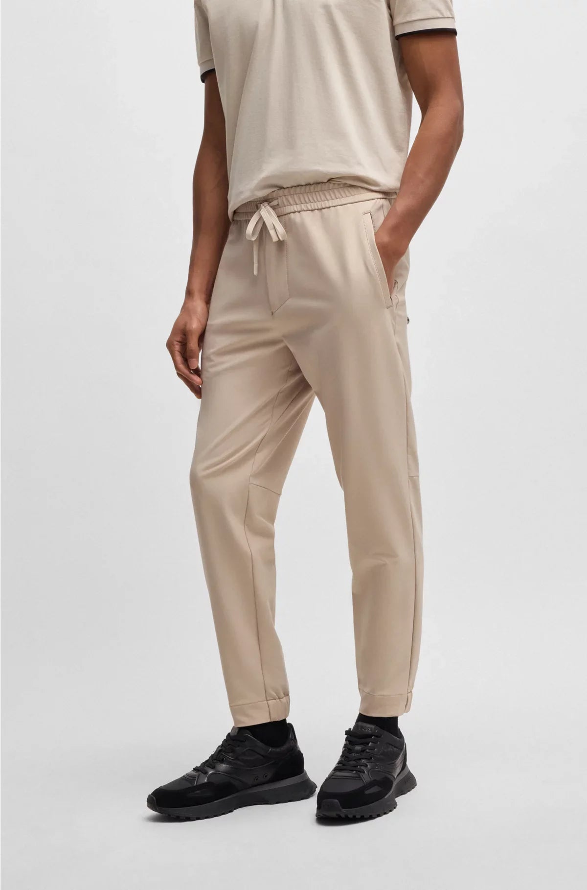 TAPERED-FIT TROUSERS IN WATER-REPELLENT STRETCH FABRIC