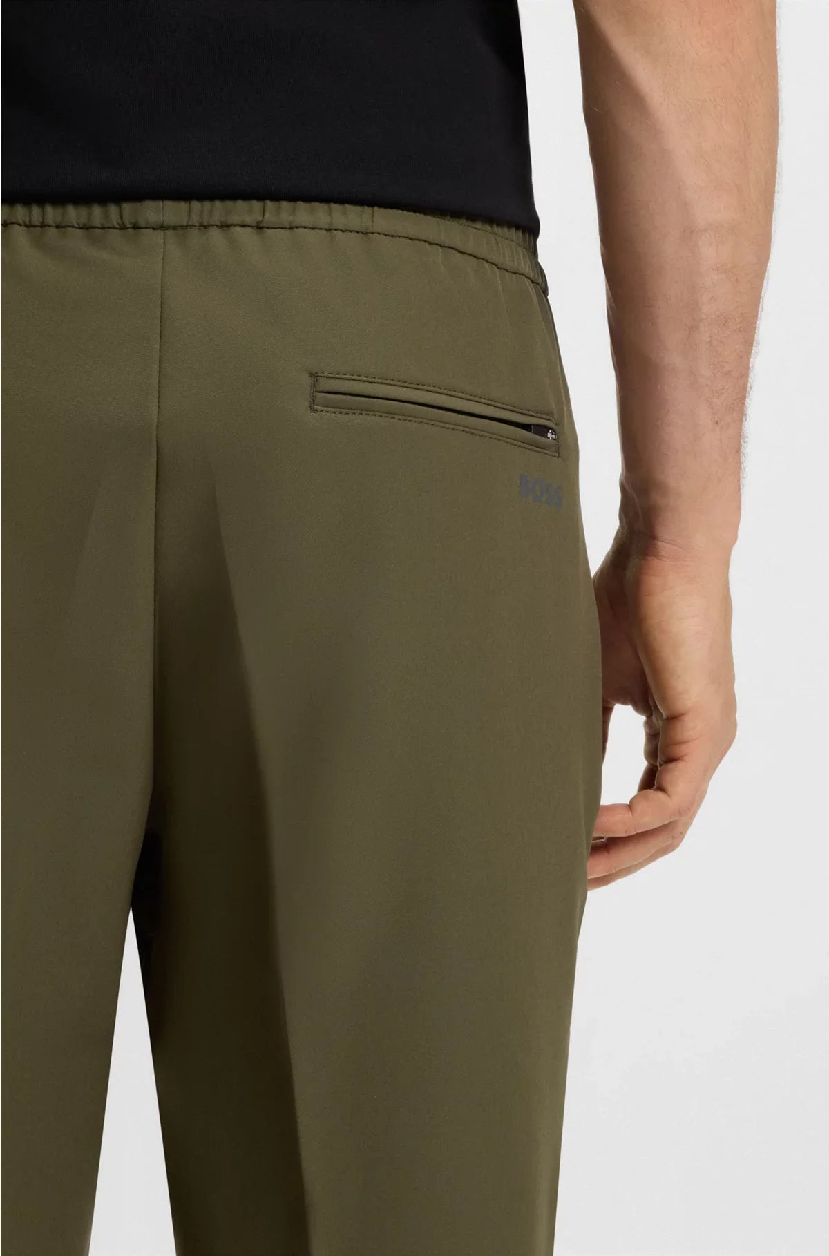 TAPERED-FIT TROUSERS IN WATER-REPELLENT STRETCH FABRIC