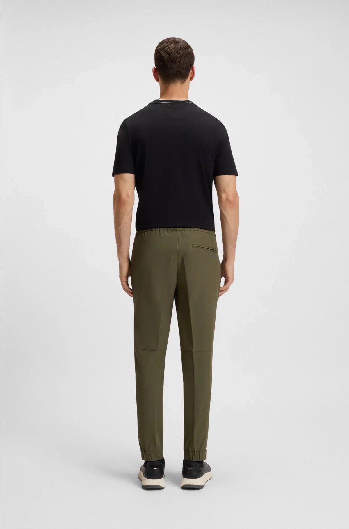TAPERED-FIT TROUSERS IN WATER-REPELLENT STRETCH FABRIC