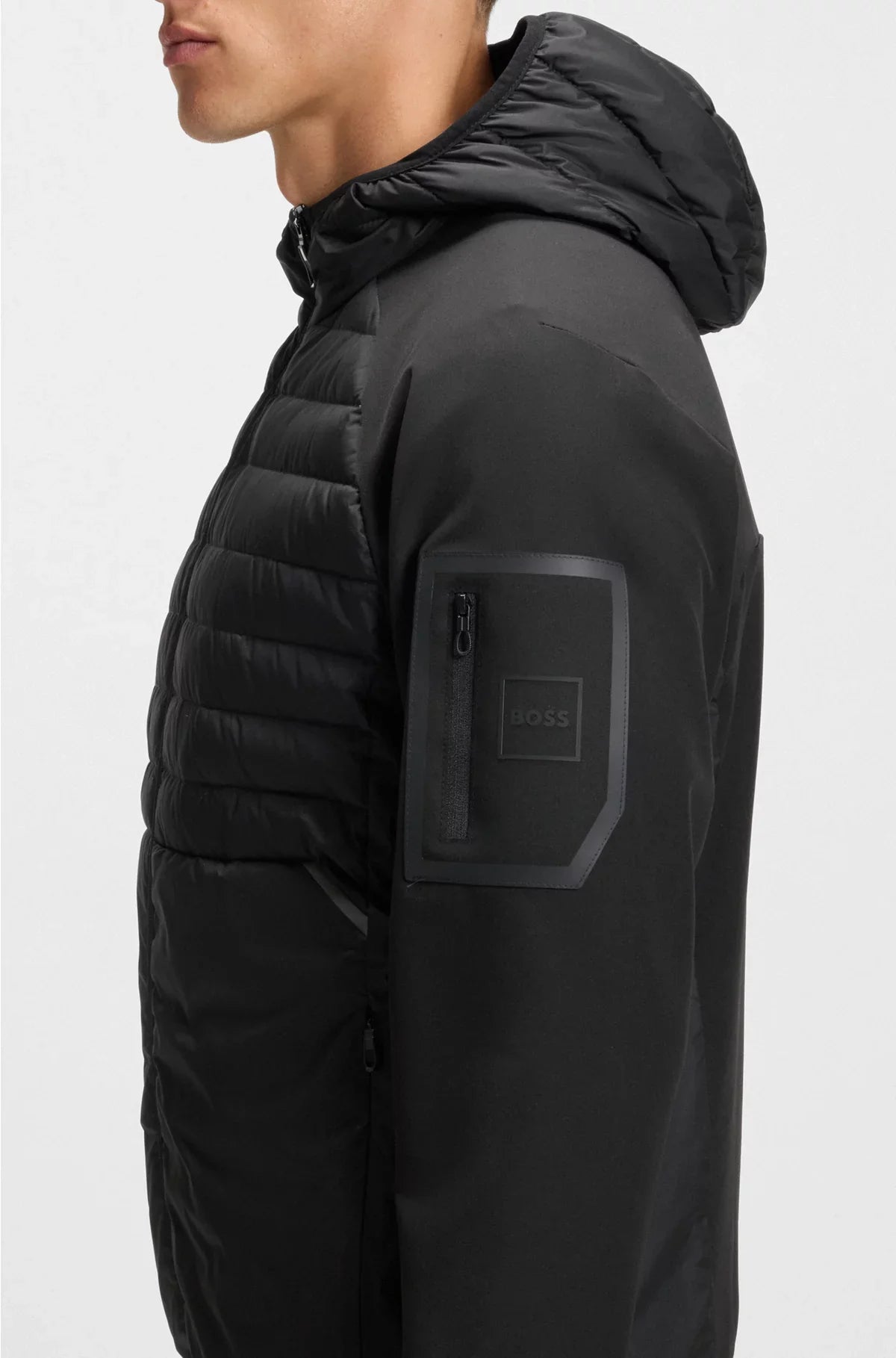 WATER-REPELLENT JACKET WITH ZIPPED SLEEVE POCKET