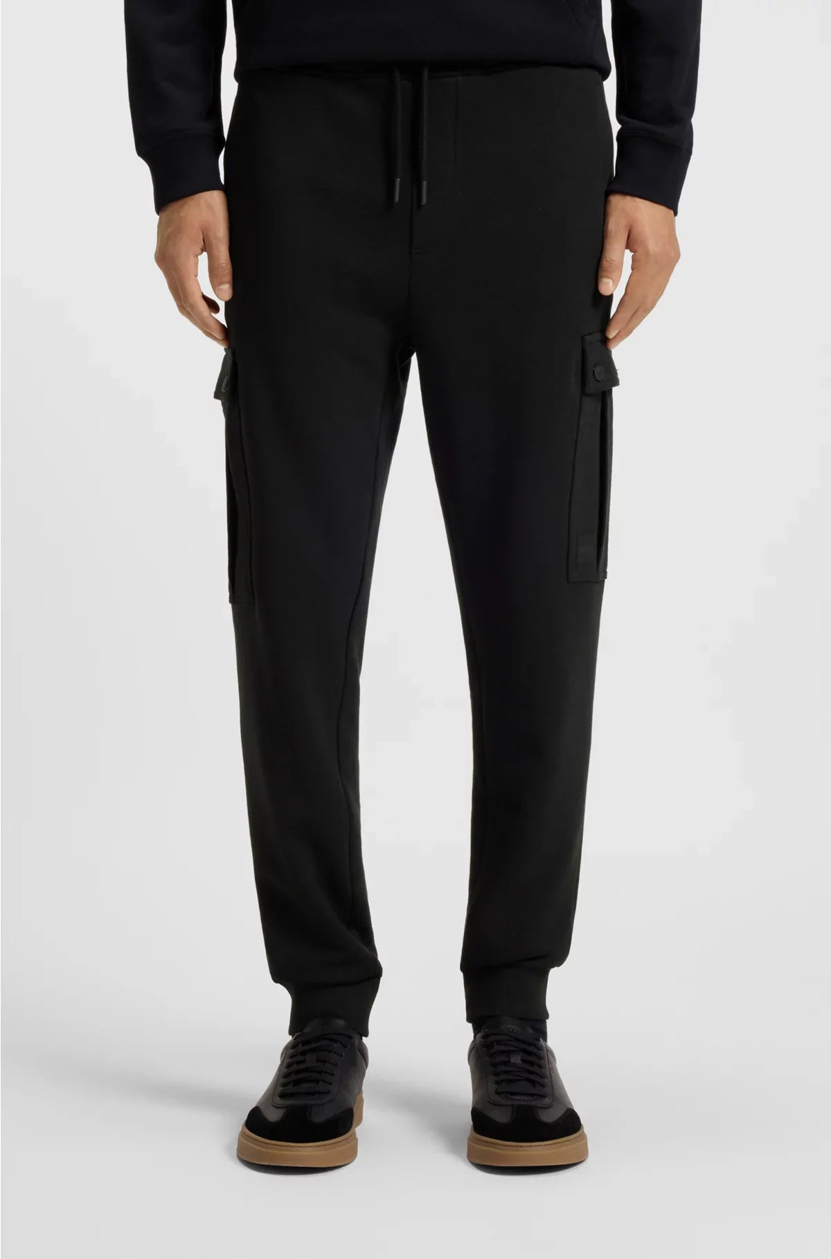 RELAXED-FIT COTTON-TERRY TRACKSUIT BOTTOMS WITH CARGO POCKETS
