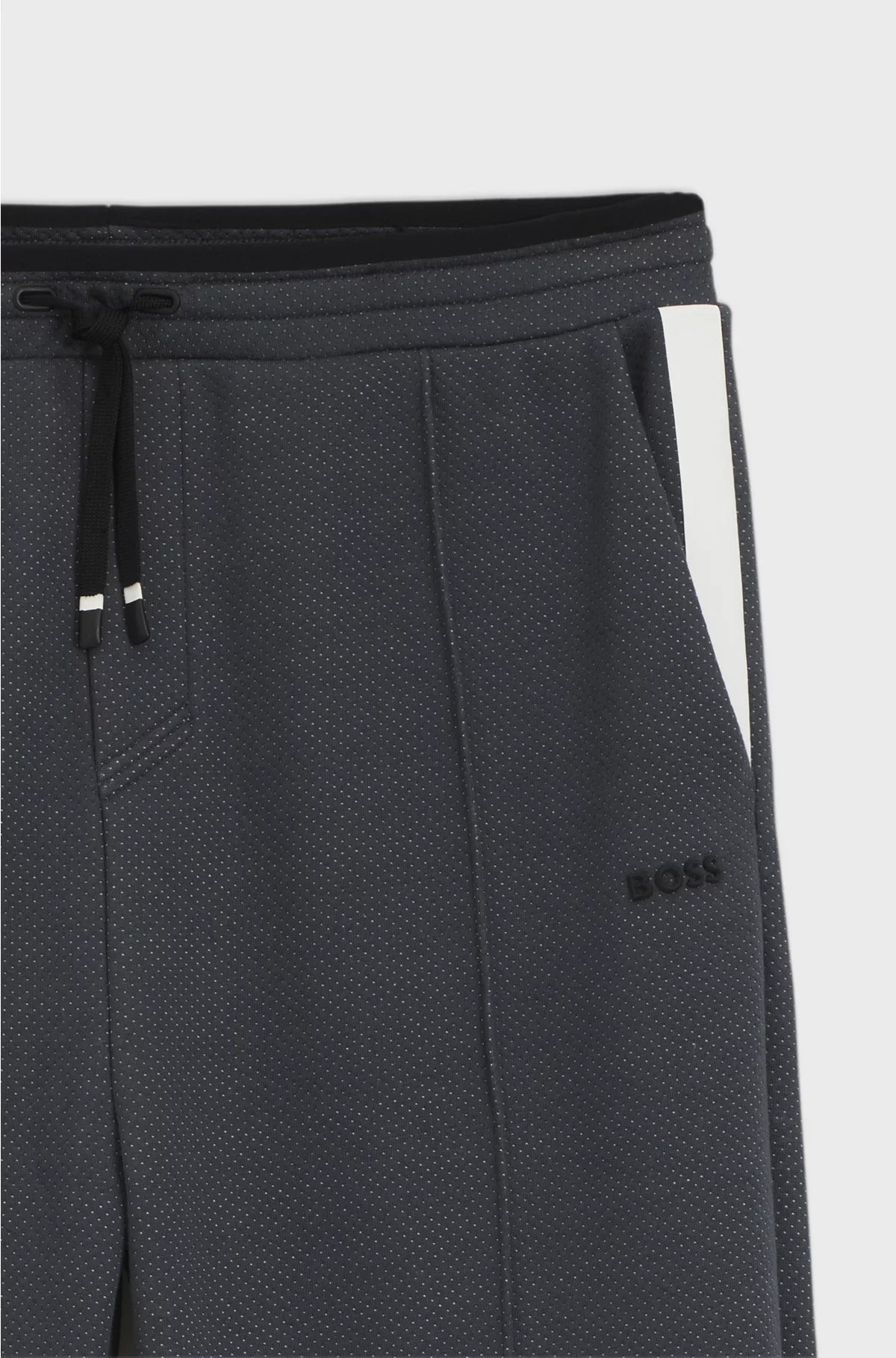 RELAXED-FIT TRACKSUIT BOTTOMS IN QUILTED JACQUARD