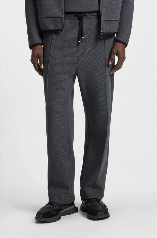 RELAXED-FIT TRACKSUIT BOTTOMS IN QUILTED JACQUARD