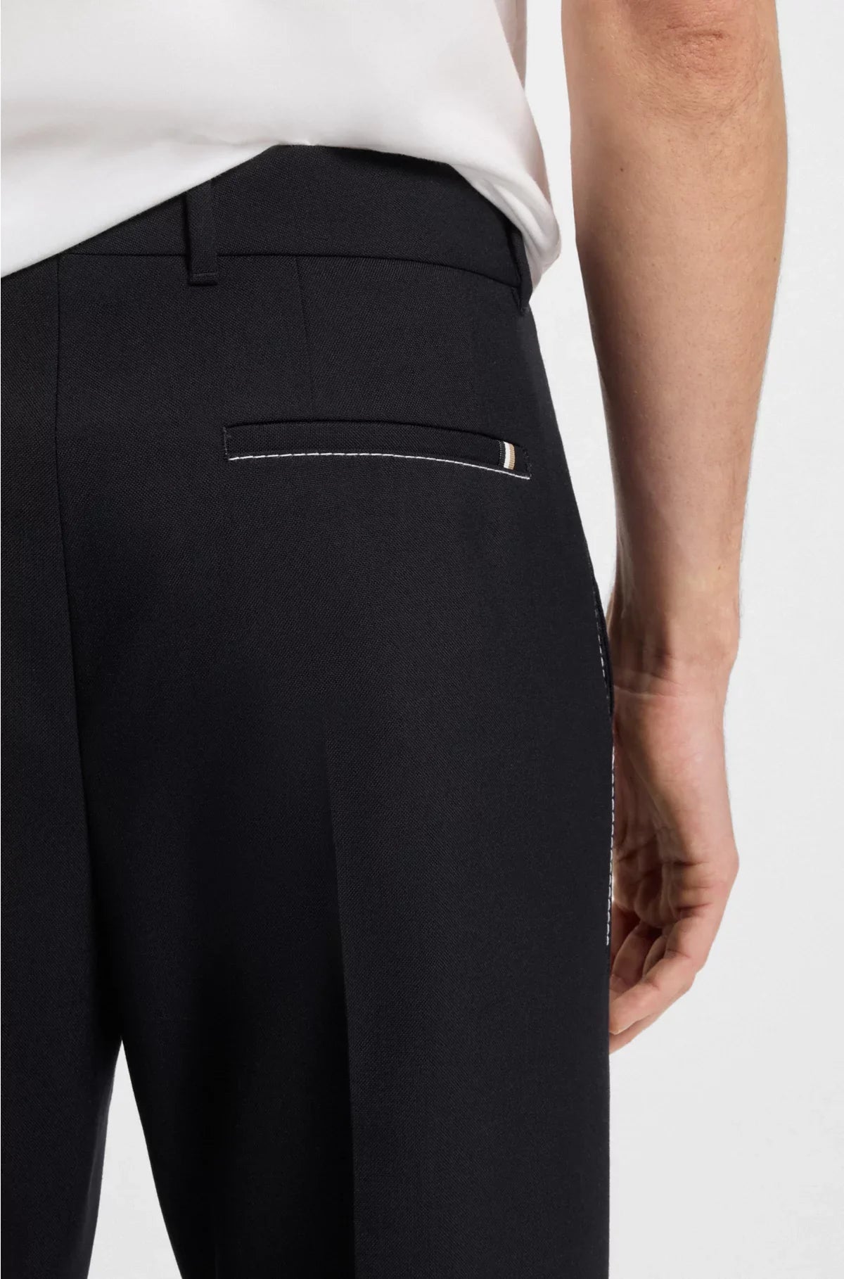 RELAXED-FIT TROUSERS IN MELANGE VIRGIN WOOL