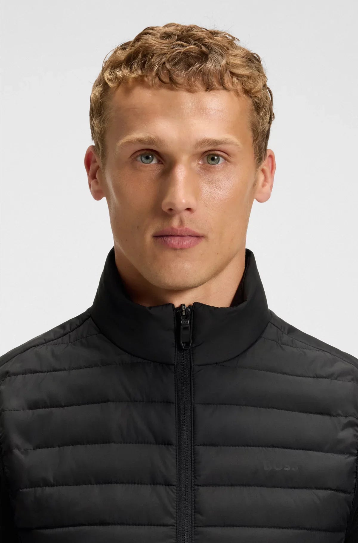 WATER-REPELLENT GILET WITH DECORATIVE REFLECTIVE ACCENTS