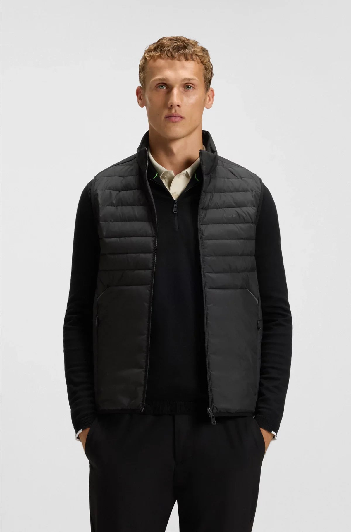 WATER-REPELLENT GILET WITH DECORATIVE REFLECTIVE ACCENTS