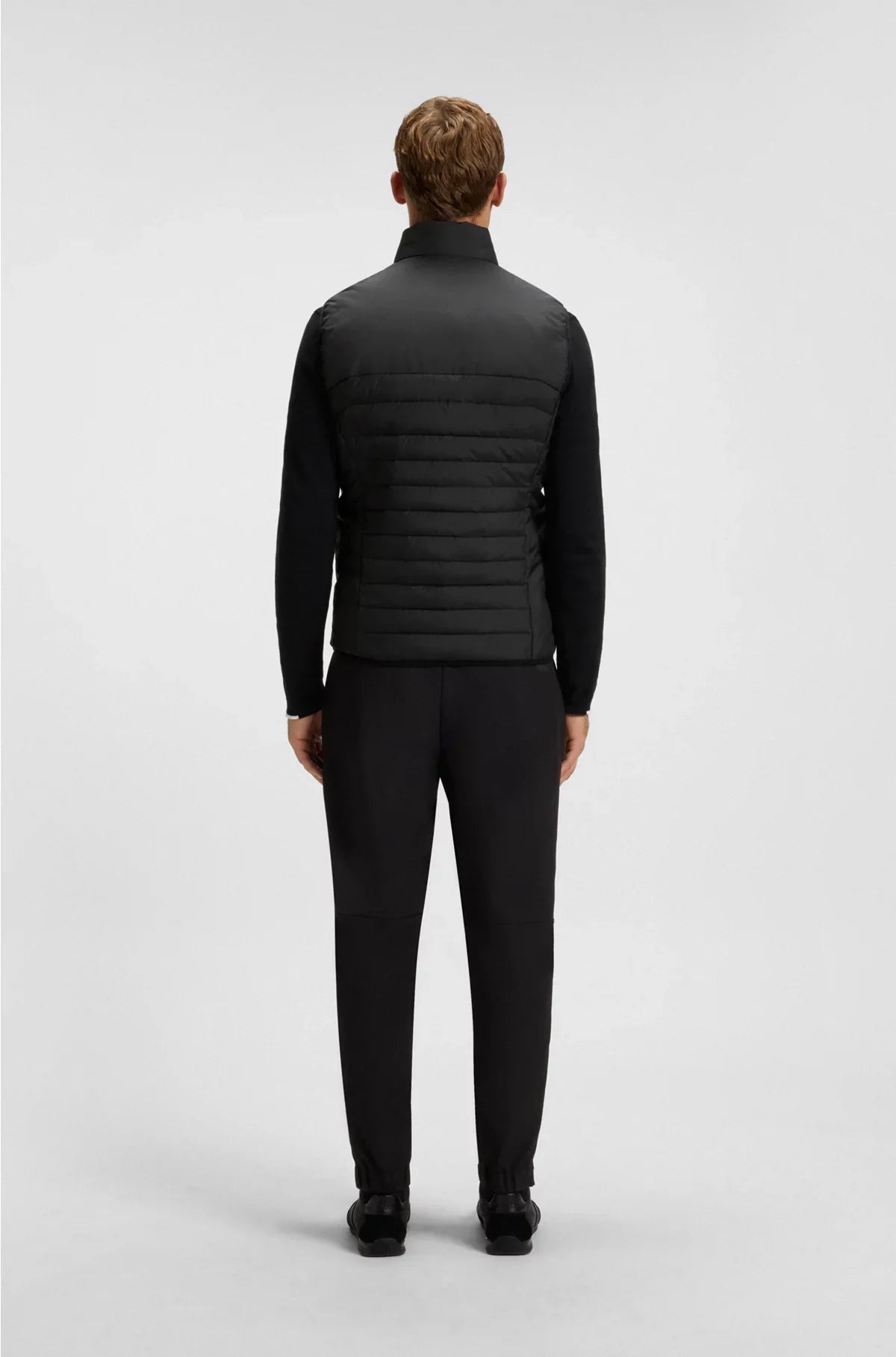 WATER-REPELLENT GILET WITH DECORATIVE REFLECTIVE ACCENTS