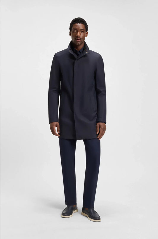 COAT WITH CONCEALED CLOSURE