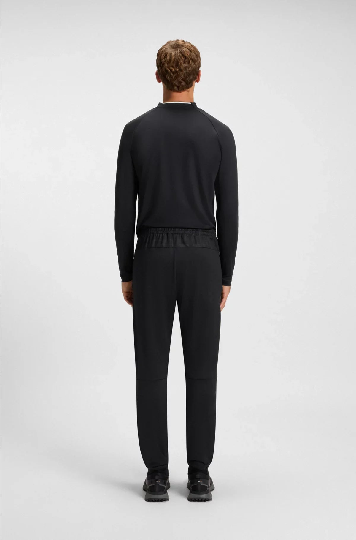 ACTIVE TRACKSUIT BOTTOMS IN GRAPHIC-PRINT PERFORMANCE FABRIC