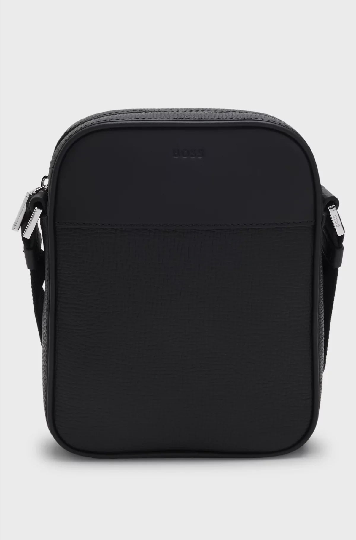 REPORTER BAG IN PLAIN AND TEXTURED LEATHER