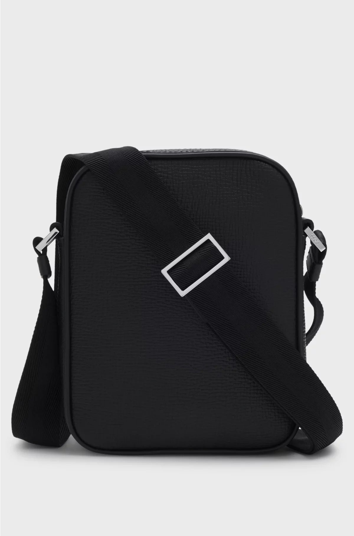 REPORTER BAG IN PLAIN AND TEXTURED LEATHER