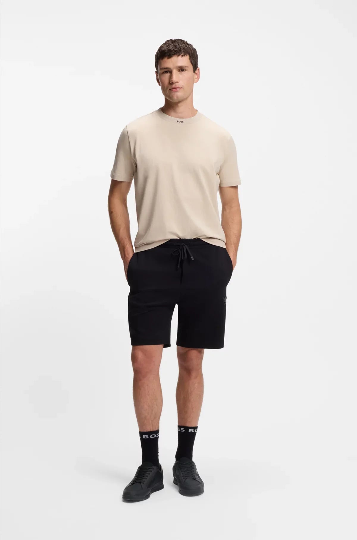SNEAKERS IN MATERIALI MISTI CON TALLONCINO A CONTRASTO