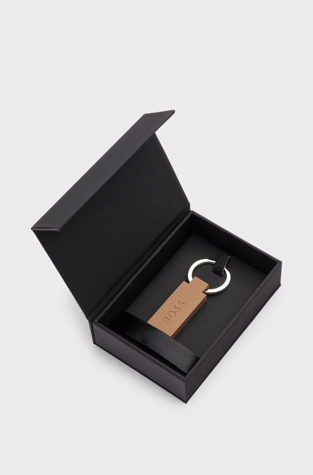 LOGO KEY RING IN CAMEL-TONED SILICONE AND BRASS