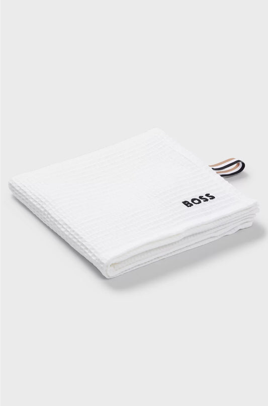 HONEYCOMB-COTTON HAND TOWEL WITH SIGNATURE-STRIPE STRAP