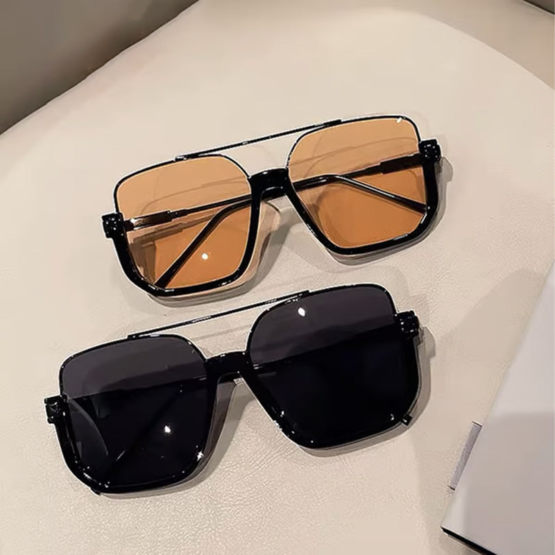 Occhiali da sole alla moda con lenti colorate e leggere